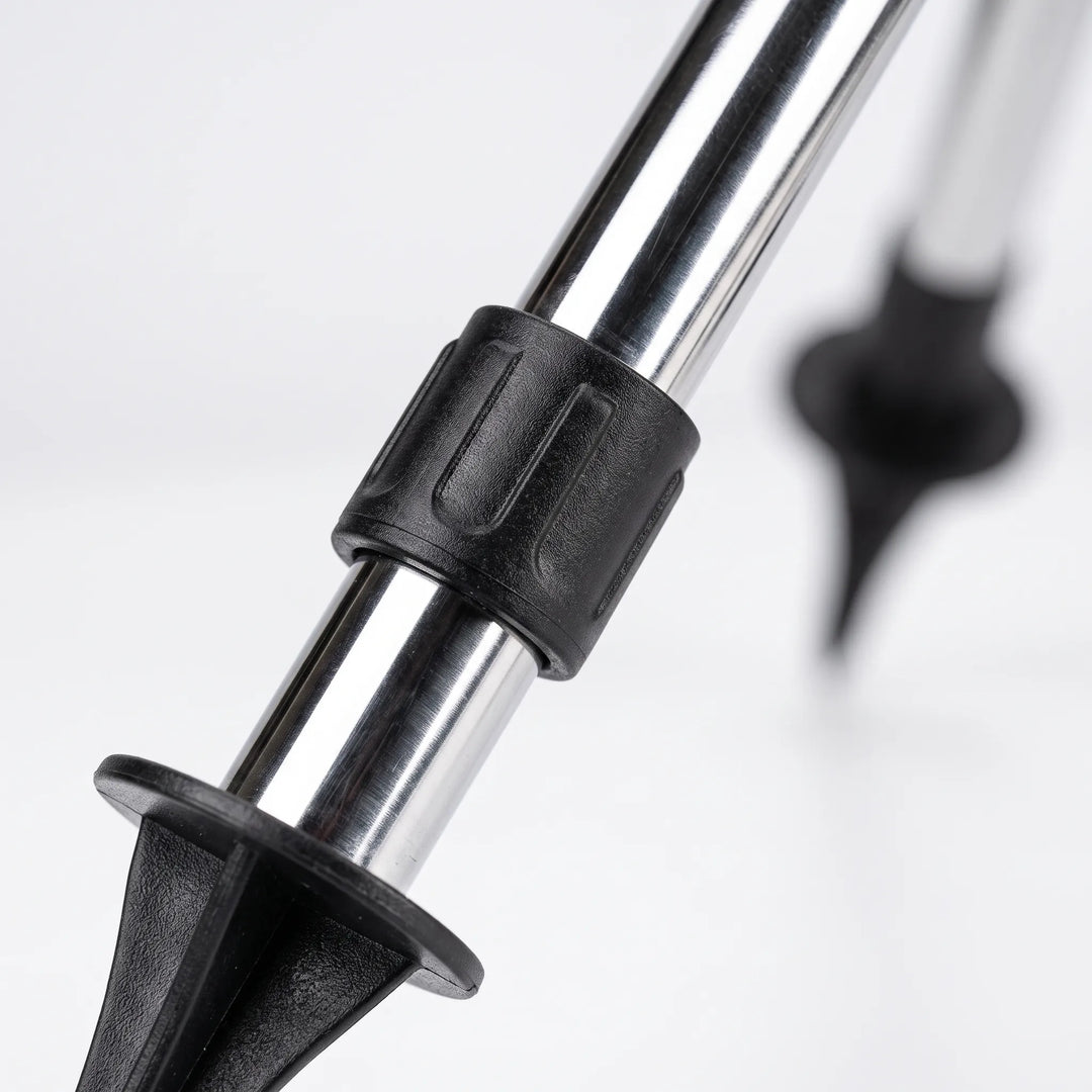 Telescoping tripod garden sprinkler with adjustable height & rotary head for flexible outdoor lawn care & irrigation.