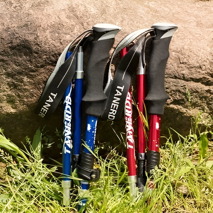 Foldable & adjustable hiking poles. Portable lightweight outdoor gear for easy packing on any trail adventure.