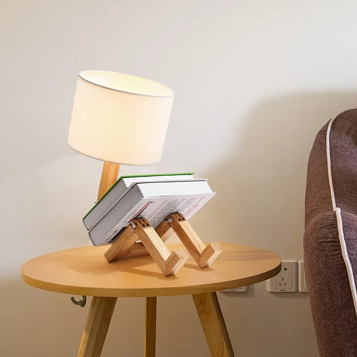 Versatile wooden table lamp. Adjustable for task or accent lighting, includes convenient storage tray.