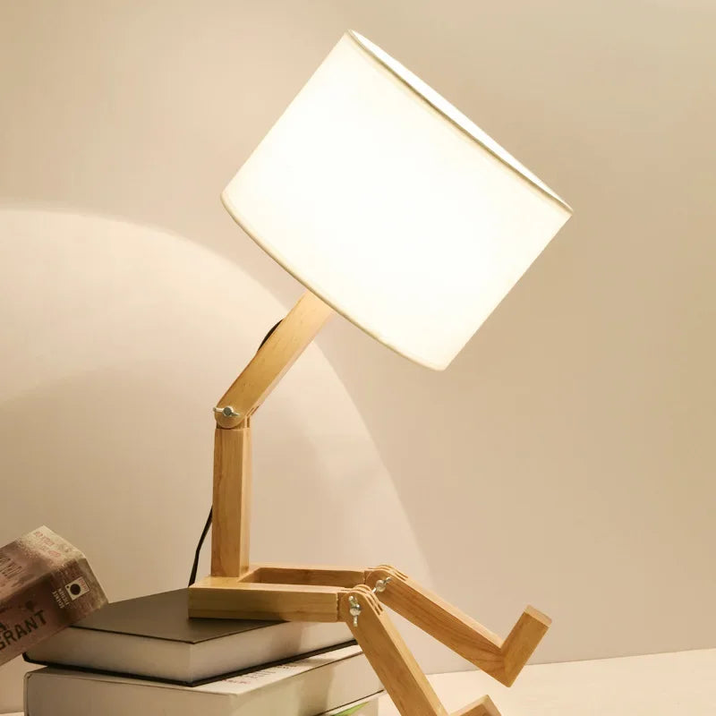 Contemporary wooden desk lamp with an adjustable neck and a handy storage base for a tidy look.