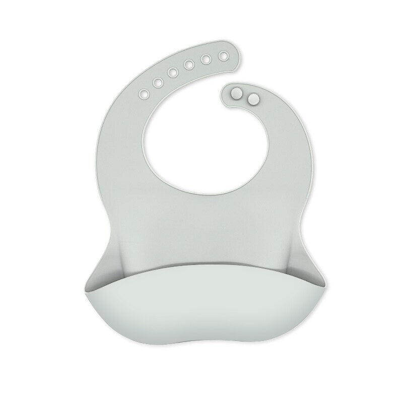 Cute lion and zebra print waterproof silicone bib for babies, adjustable and soft for comfortable mealtime.