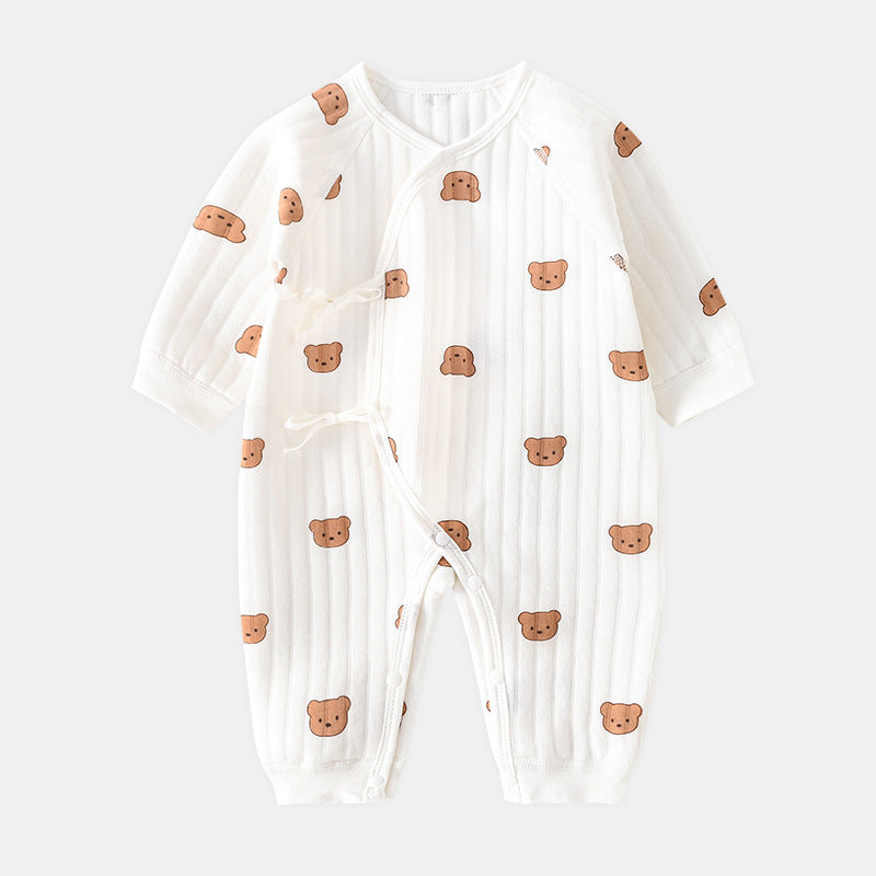 Toddler sitting comfortably in a breathable cotton bear themed romper, soft infant clothing
