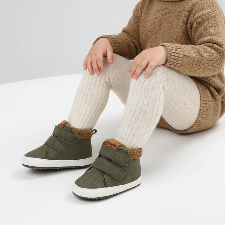Snug baby bunny winter boots with reliable Velcro strap, ensuring warmth and stability.