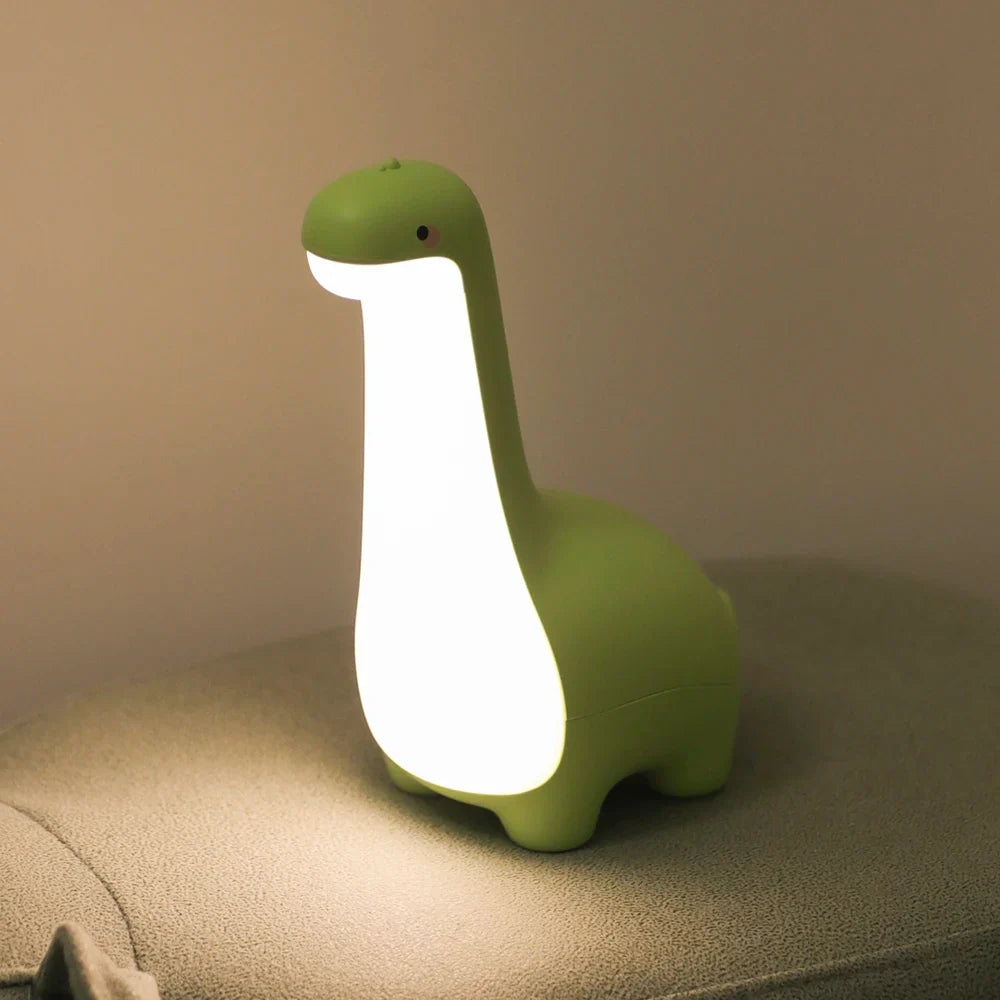 Cute dinosaur LED lamp, ideal for nursery decor & a gentle sleep aid for toddlers. Soft silicone body.