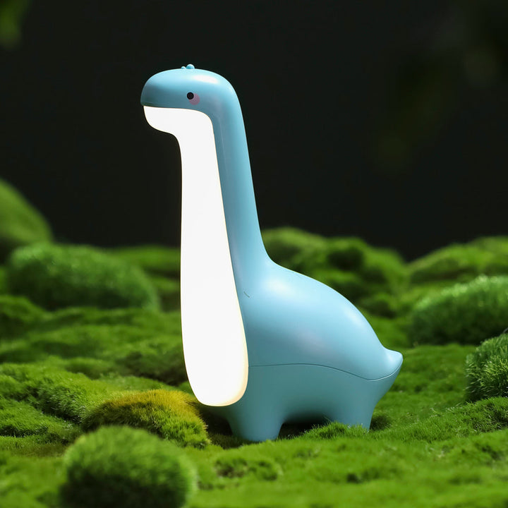 Kids' rechargeable dinosaur LED lamp provides a comforting glow, perfect for bedtime & nursery decor.