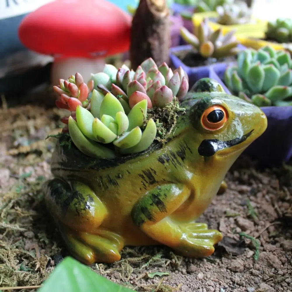 Charming frog-shaped ceramic planter. Decorative pot for indoor plants, outdoor decor, or a unique garden gift.