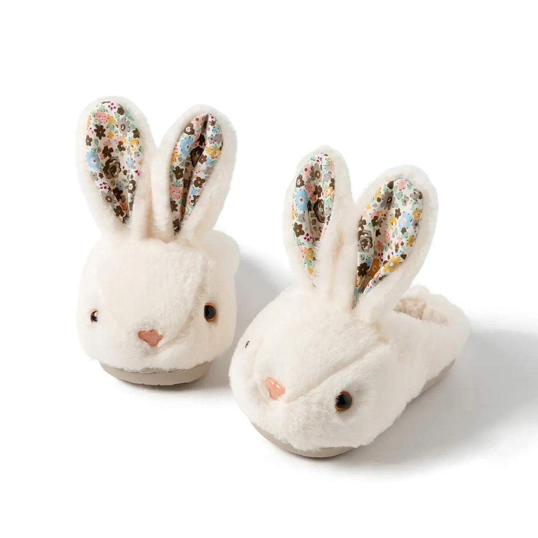 Adorable kids' plush bunny slippers with anti-slip soles. Cozy, soft comfort for toddlers and infants.