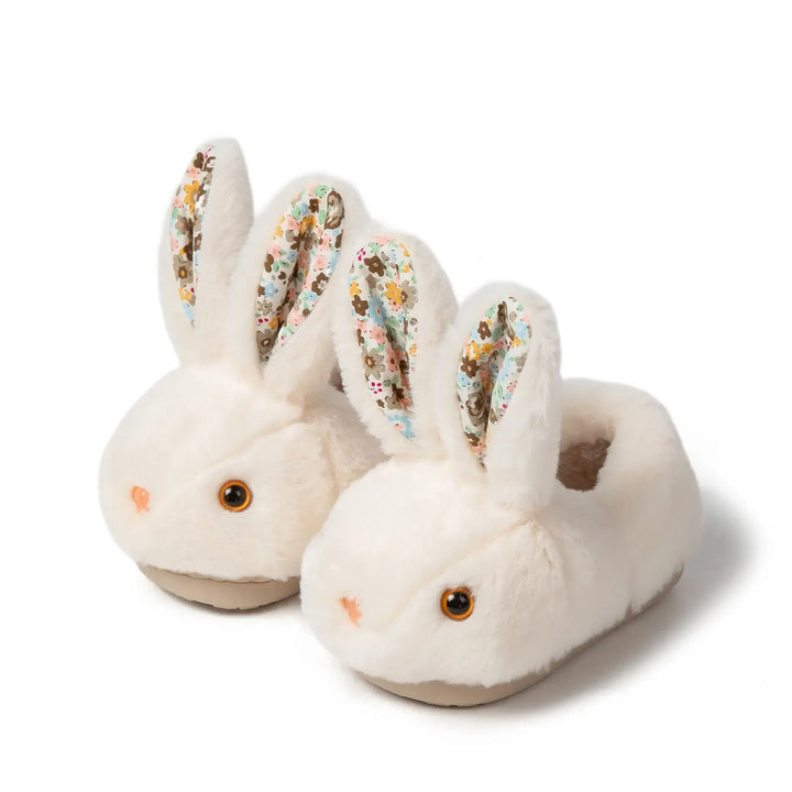 Soft plush bunny slippers for kids. Comfortable, anti-slip sole for safe indoor play. Ideal baby footwear.