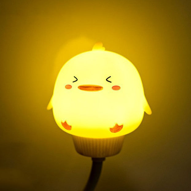 Playful LumiPals dinosaur LED night lamp with timer, rechargeable, a fun and safe bedside light for kids.