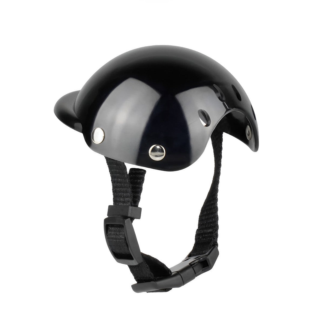 Black protective dog helmet with clear goggles ensures pet safety for motorcycle adventures & travel.
