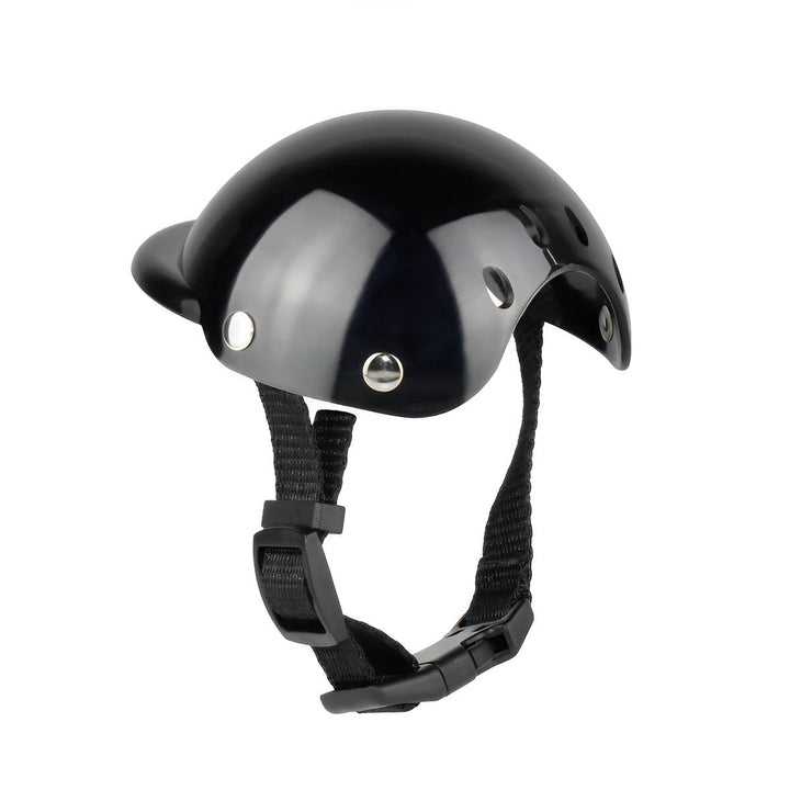 Black protective dog helmet with clear goggles ensures pet safety for motorcycle adventures & travel.