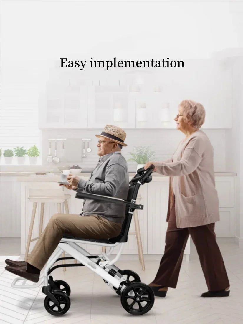 Elderly user comfortably seated in an Aeris lightweight wheelchair, highlighting its ease of use.