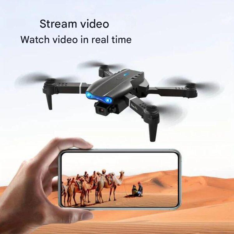 Close-up of AeroVision dual camera drone, highlighting 4K UHD lens & sleek design for aerial photography.