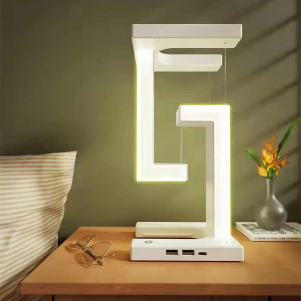 Top-down view of the AetherGlow wireless charging desk lamp, highlighting its compact and functional design.