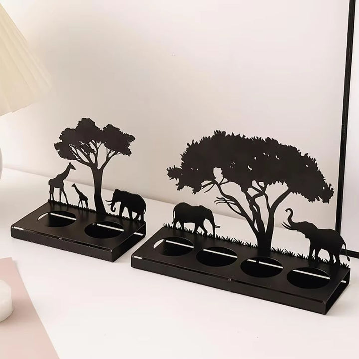 Elegant African elephant & giraffe silhouette candle holders. Enhance safari home decor, perfect tabletop accent.