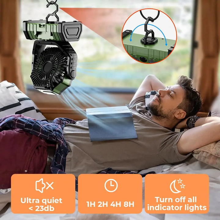 Close-up of portable Airmate camping fan with integrated LED light, showing remote control and charging port.