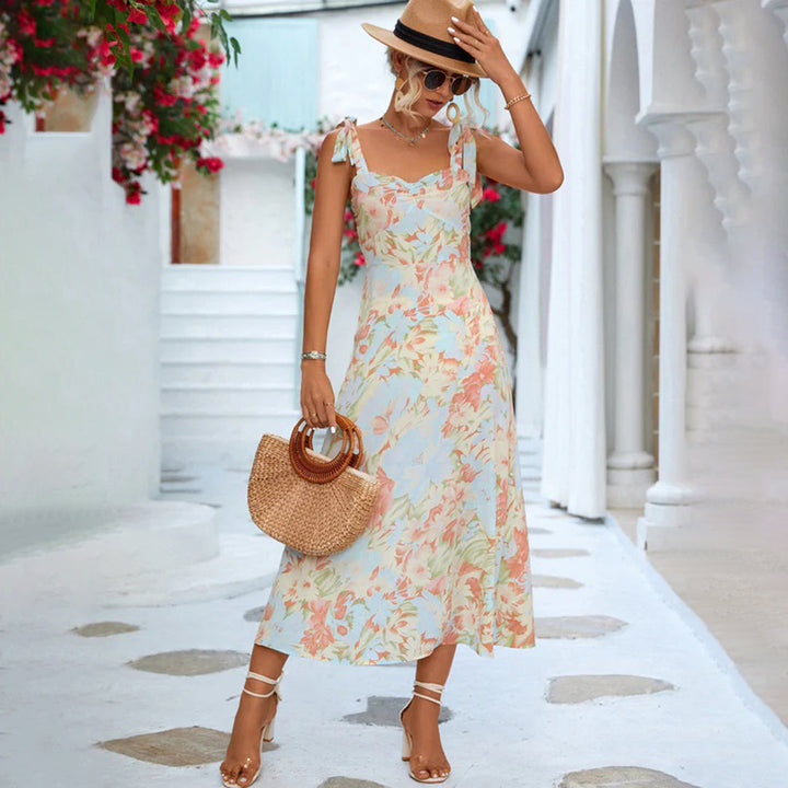 Stylish women's sleeveless floral midi dress, made from lightweight, breathable polyester fabric