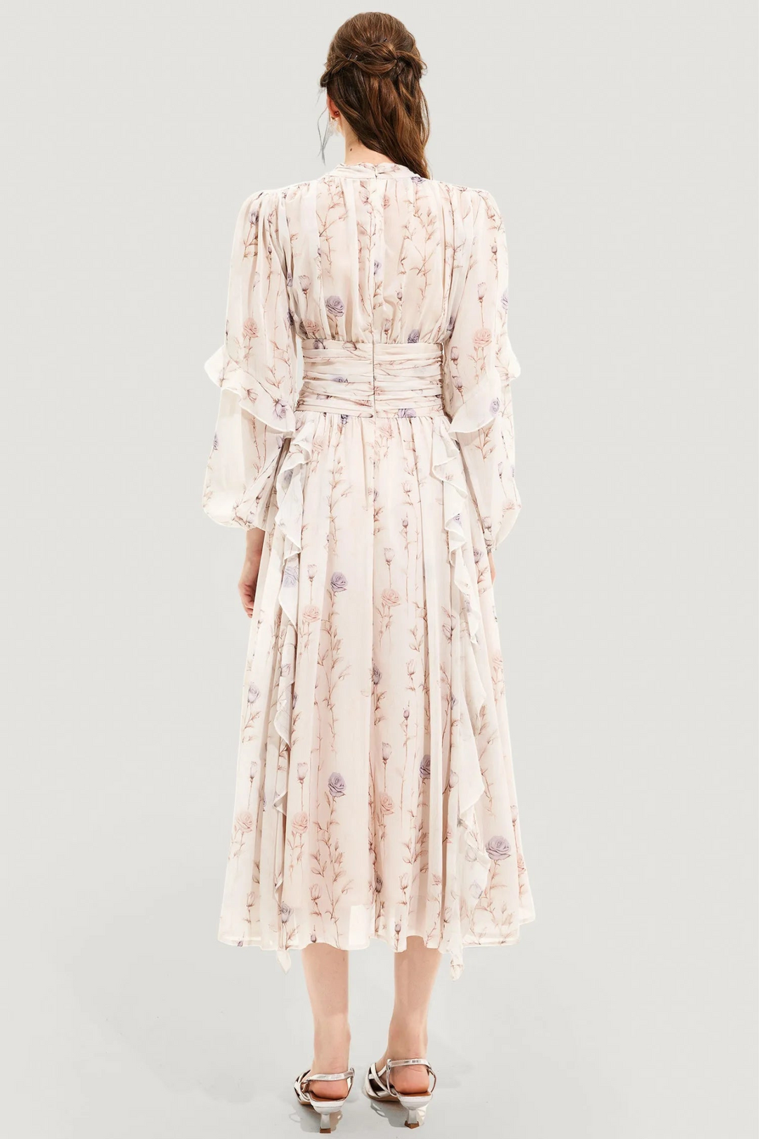 Fashionable Alina women's summer dress, featuring a beautiful floral print and a stylish pleated skirt in a versatile beige hue.