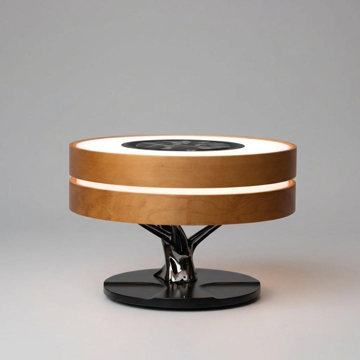 Unisex AmbiLuxe multifunctional wireless charging lamp with integrated Bluetooth speaker and ambient light.