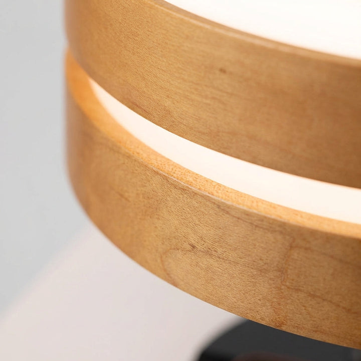 Sleek white AmbiLuxe desk lamp with wireless charger and Bluetooth speaker, perfect for modern home decor.