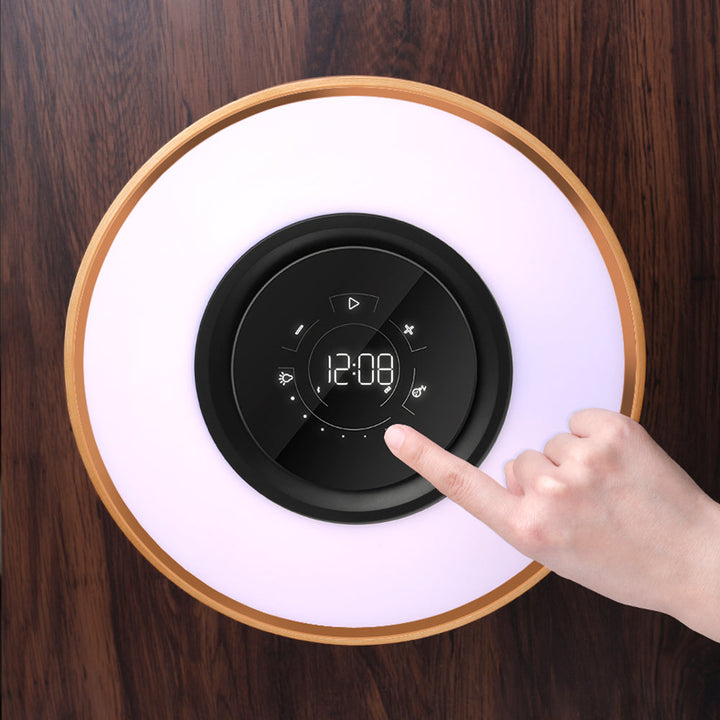 AmbiLuxe: A smart LED lamp with wireless charging and built-in Bluetooth speaker, a great gift idea.