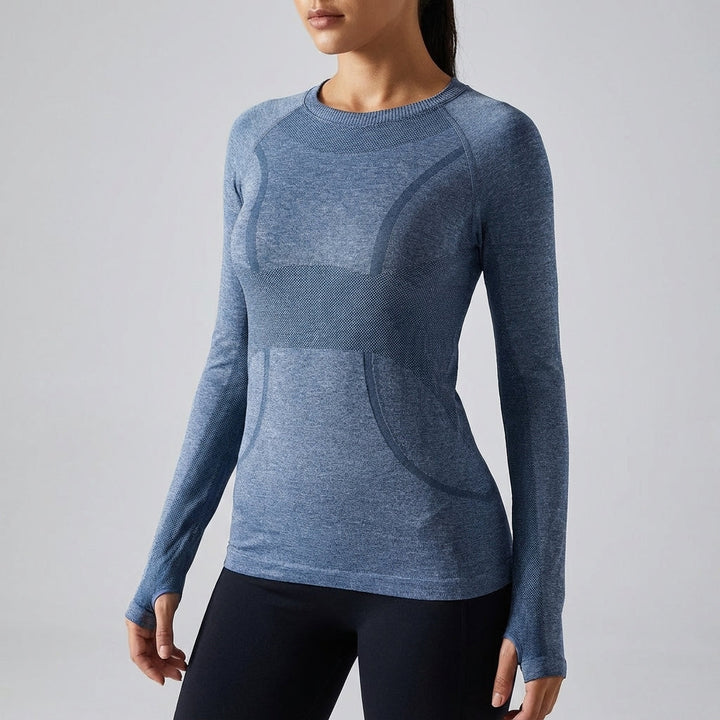 Model in a green Amelia long sleeve quick-dry running shirt, perfect for women's sportswear