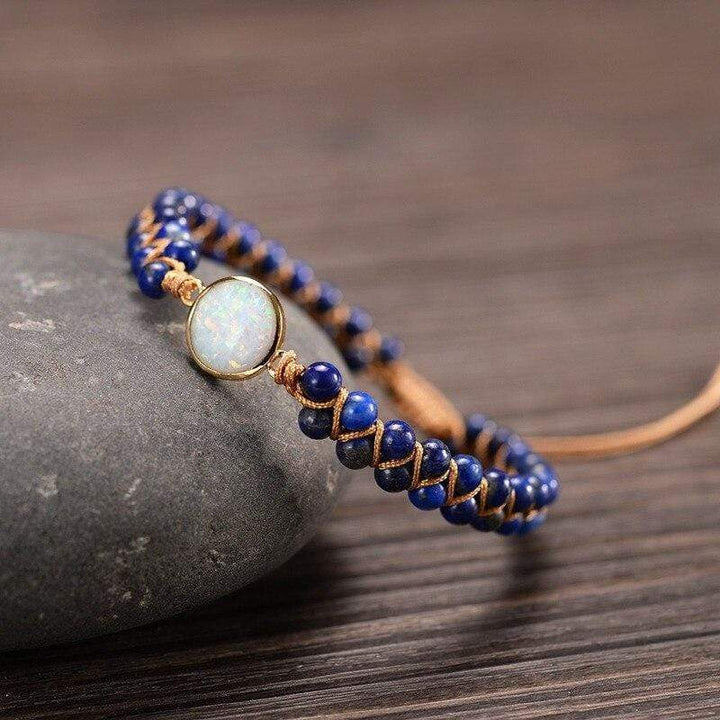 Elegant women's Amethyst and Opal armband, featuring vibrant healing gemstones.