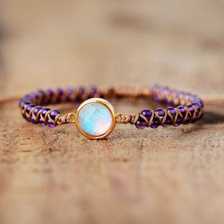 Detail shot of the Amethyst and Opal beads on a women's Zen yoga bracelet.