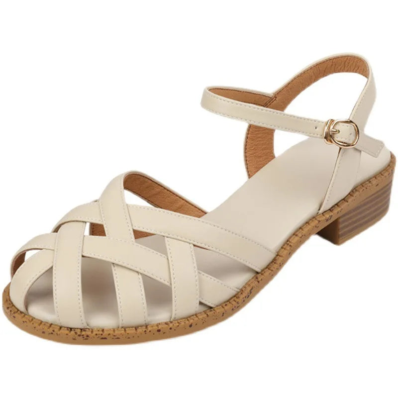 Stylish Amira women's flat sandals in a neutral color, perfect for summer everyday wear