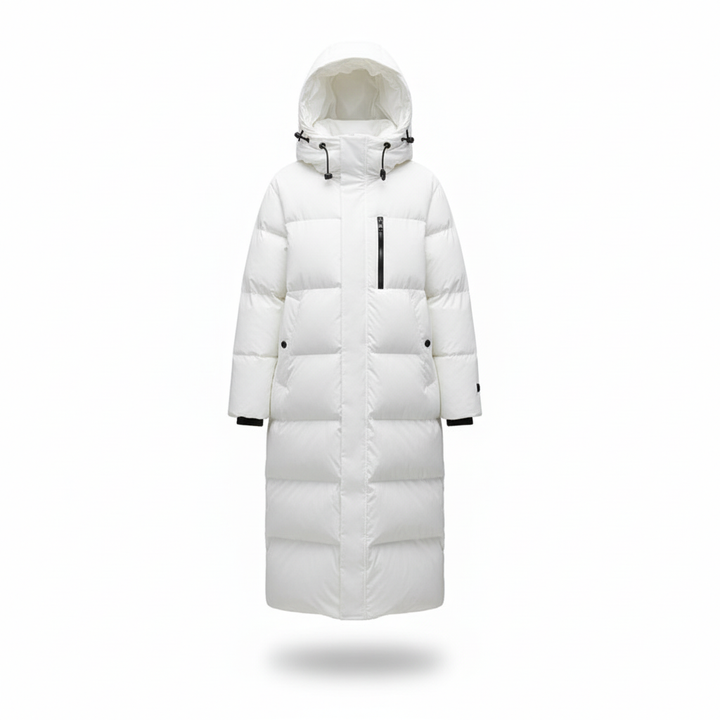 Full-body shot of a woman wearing the Annalena long down jacket, showcasing its elegant fit and warmth