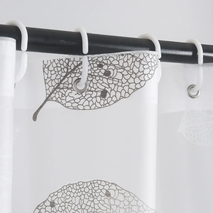 Bathroom decorated with an AquaLeaf shower curtain; subtle leaf print & water repellent