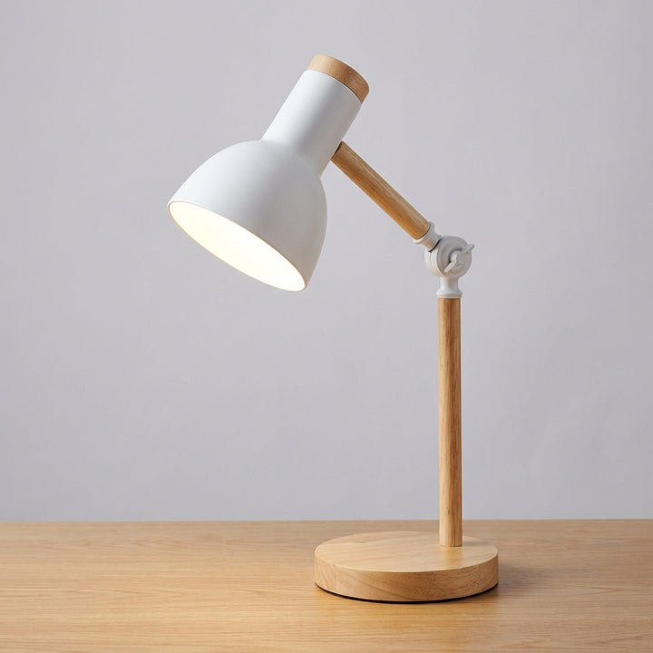 Nordic design desk lamp by Arclume, adjustable for reading and focused task lighting on a table