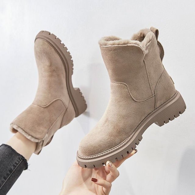 Waterproof Aria winter boots for women, offering cozy warmth & reliable grip for snowy days.