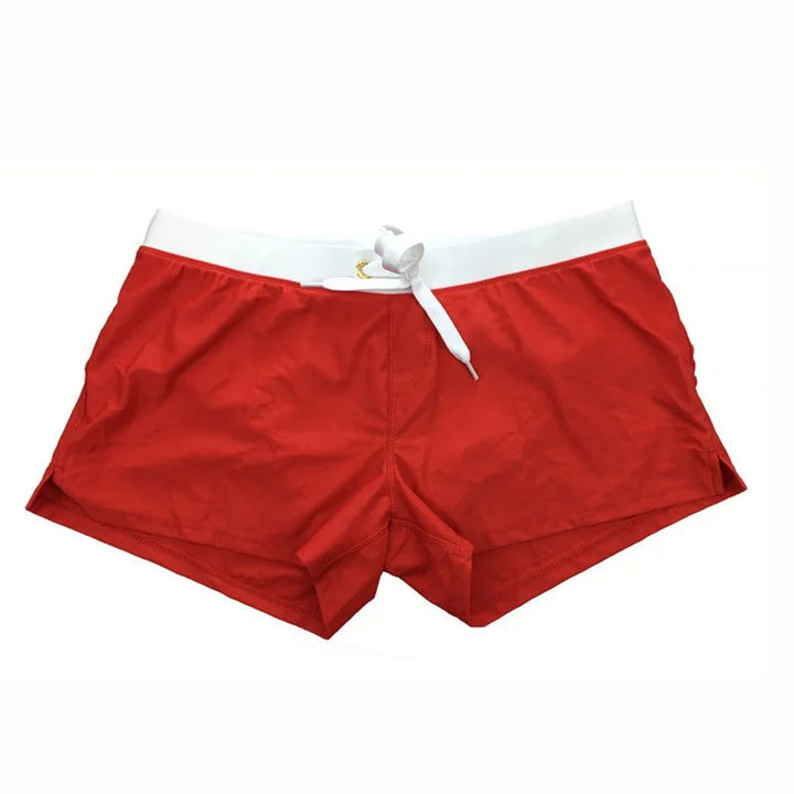 Arlan men's swimwear: classic black quick-dry shorts, essential for men's apparel and board shorts