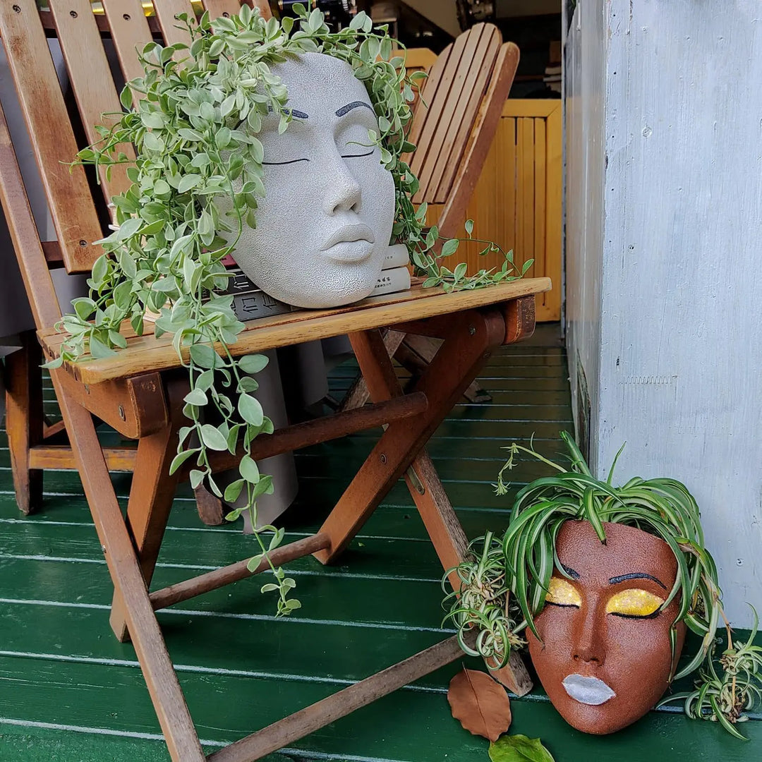 Captivating human face wall planter, a detailed modern art piece. Perfect unique indoor plant holder for decorative appeal.