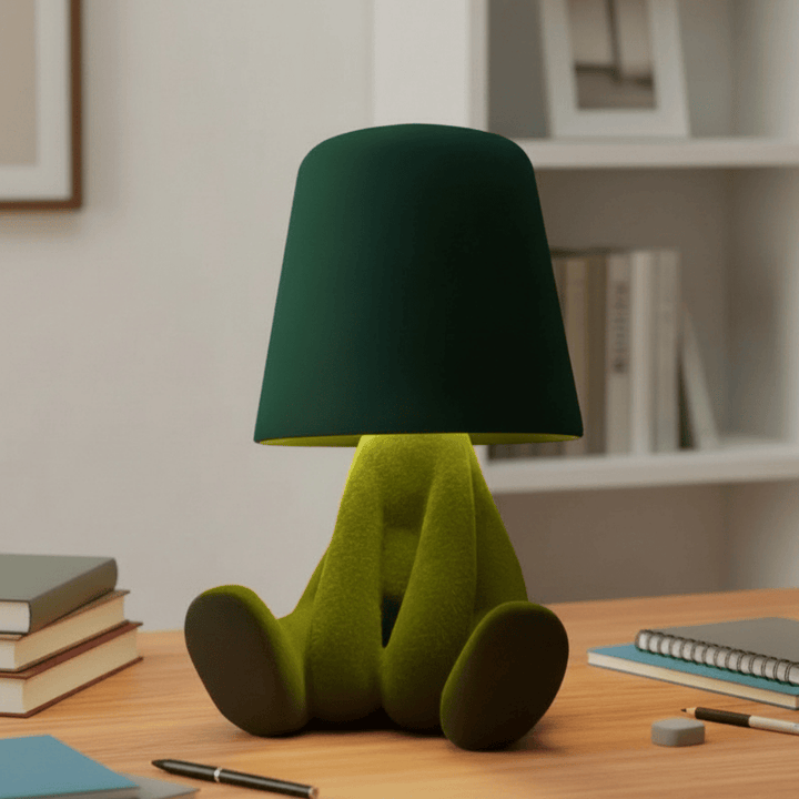 Artistic human figure LED desk lamp. Modern rechargeable table lamp for creative room lighting.