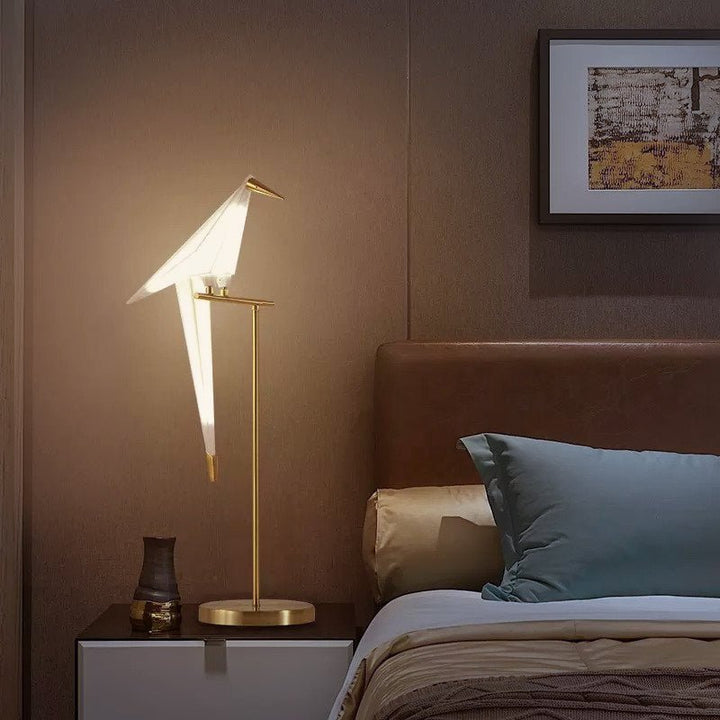 Contemporary magnetic bird lamp providing soft accent light, ideal for living rooms or bedrooms.