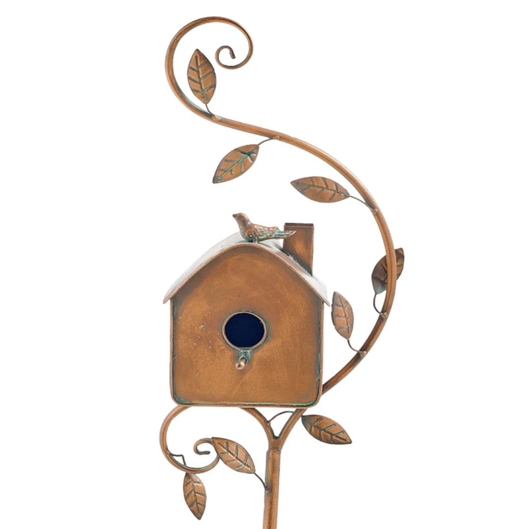 Charming metal birdhouse garden stake, rustic wildlife feeder & artistic outdoor garden decor.
