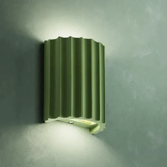 Vibrant artistic wall sconce, a colorful modern lighting fixture creating unique accent lighting.