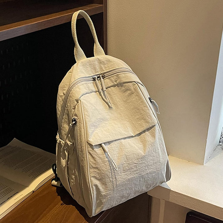 Lightweight multi-compartment waterproof backpack by Arvion, ideal for students and travelers