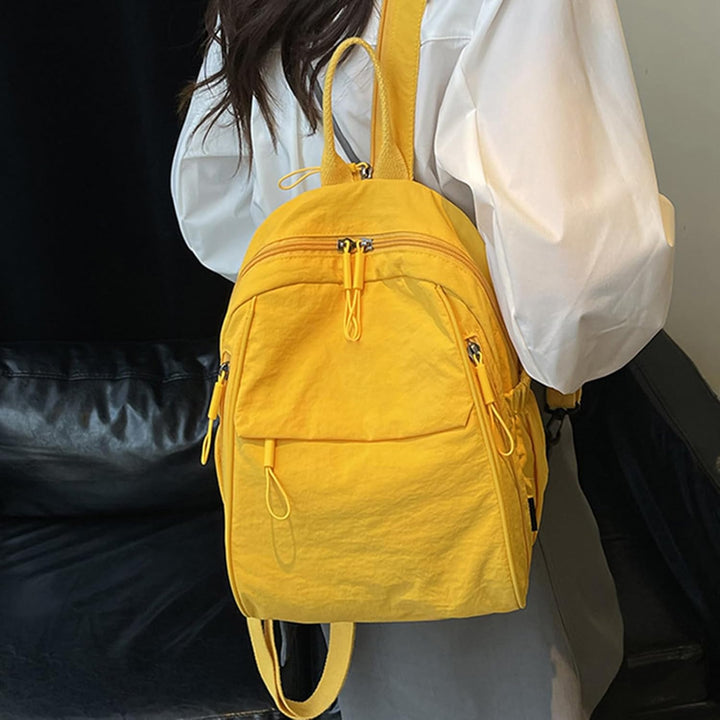 Lightweight waterproof backpack by Arvion, casual nylon schoolbag in a vibrant color, side view