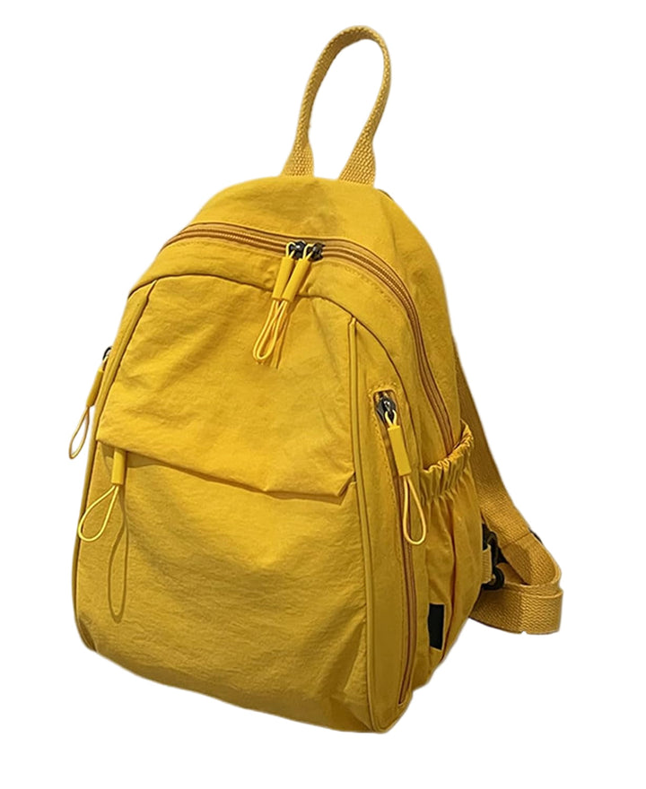 Unisex waterproof backpack, Arvion brand, perfect for school & travel, standing on a wooden floor