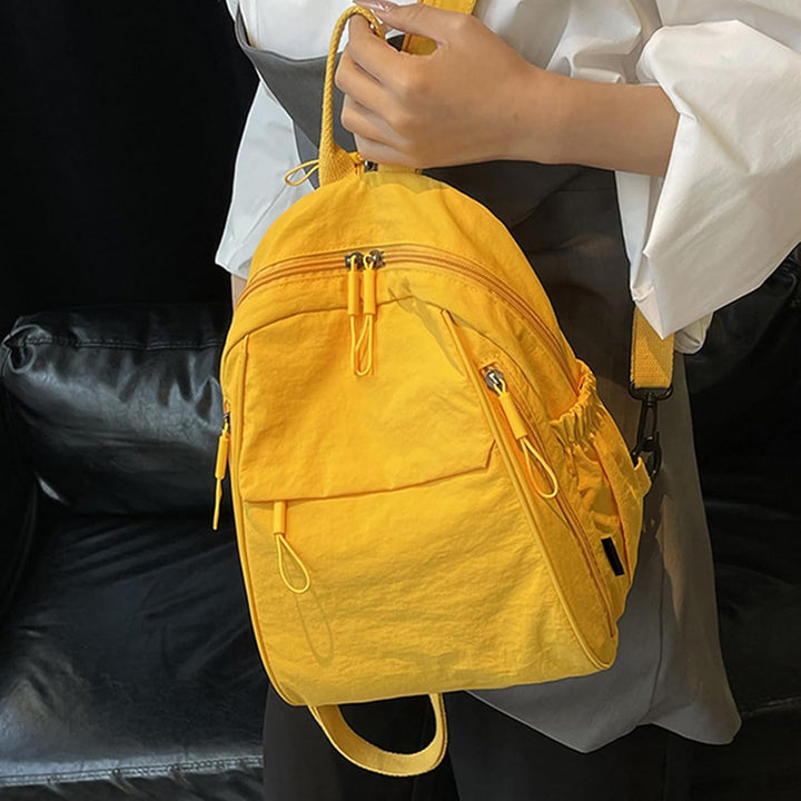 Casual everyday waterproof backpack by Arvion, spacious main compartment open, inside view
