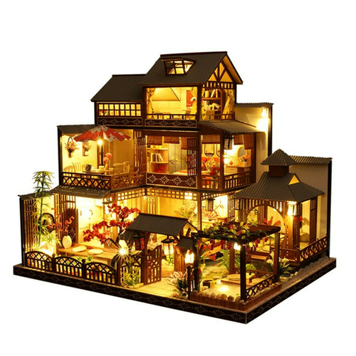 Assembled large wooden dollhouse kit with working LED lights, showcasing miniature rooms & furniture. Great DIY craft.