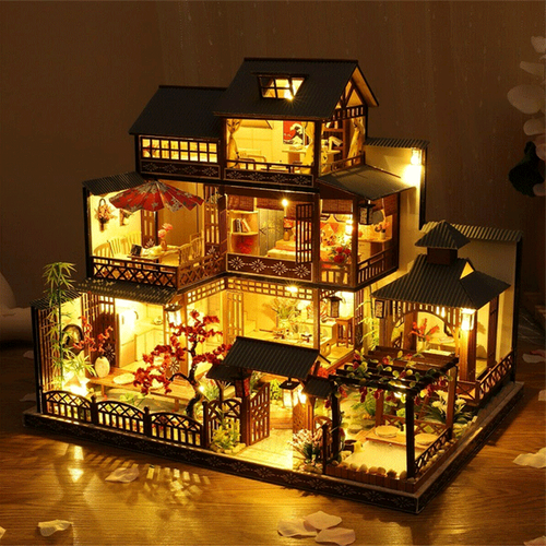 Unisex large wooden dollhouse DIY craft kit components, unbuilt. Includes pieces for miniature playhouse & LED lights.