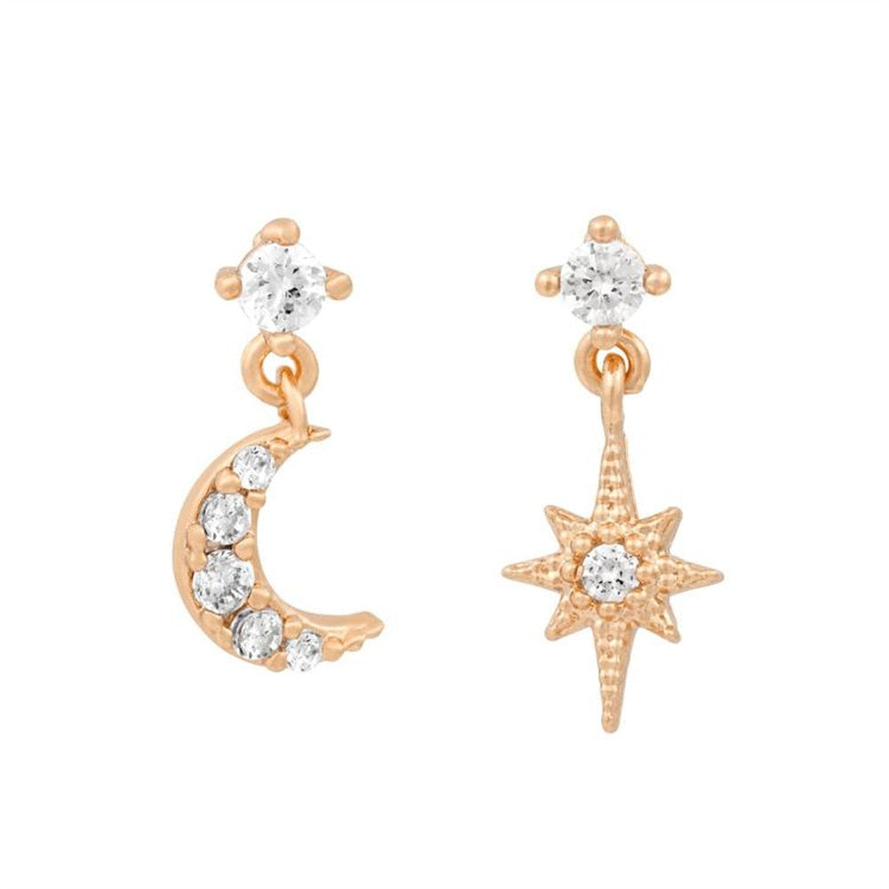 Close-up of Astrid Celestial Stud Earrings, intricate star and moon detail, women's fashion jewelry