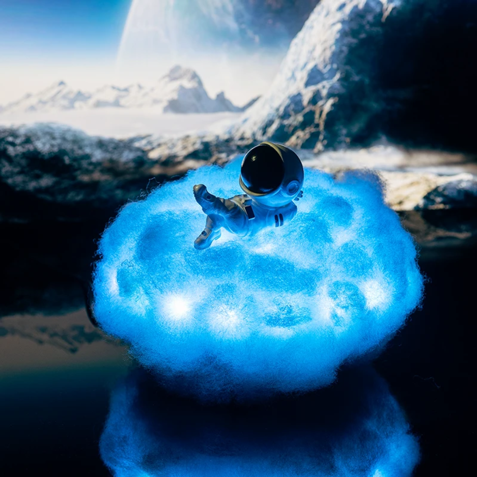 Creative Astronaut Cloud Lamp with remote control, casting a soft glow as a unique night light