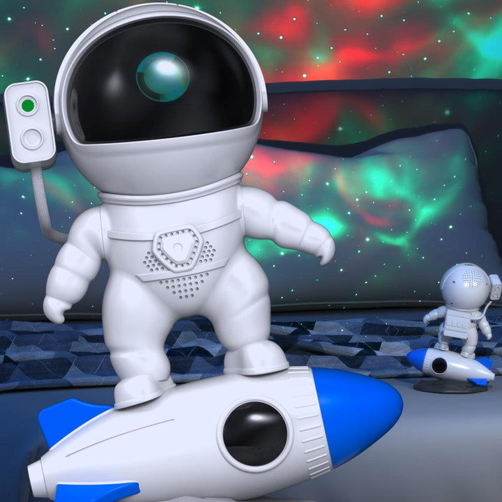 Close-up of the astronaut projector, highlighting its design and the vibrant galaxy light it emits.