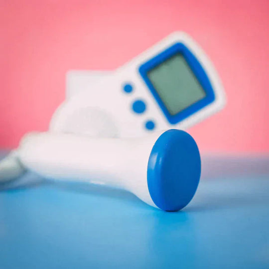Compact fetal doppler allowing expectant parents to hear baby's heartbeat at home. Perfect prenatal monitor.