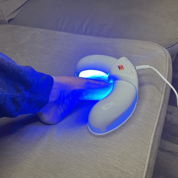 At-home laser nail fungus treatment device for effective fungus removal and healthy nails. Personal foot care solution.